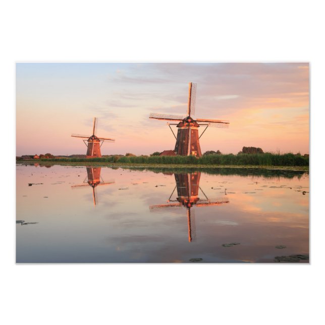 Two windmills with reflection at sunset photo print (Front)