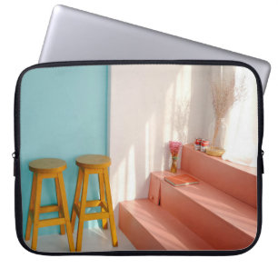 Two yellow wooden bar stools laptop sleeve