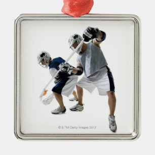 Two young men playing lacrosse metal tree decoration