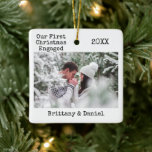Typewriter Text First Christmas Engaged Photo Ceramic Ornament<br><div class="desc">Modern Trendy Typewriter Text Simple Minimalist,  Our First Christmas Engaged Couple Photo Ceramic Ornament</div>