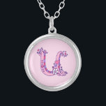 U monogram decorative letter necklace<br><div class="desc">Pretty letter U monogram pendant. Whimsical letter drawing of the capital initial letter U ideal for gifting girls with a name that begins with a U. Background colour can be changed if required,  currently light pink. © Original drawing and design by Sarah Trett www.sarahtrett.com for www.mylittleeden.com</div>