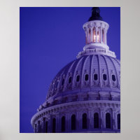 U.S Capitol at dusk with light in dome on
