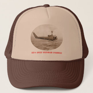 UH-1 over vietnam paddies Trucker Hat
