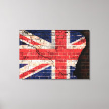 UK flag on a cracked brick wall