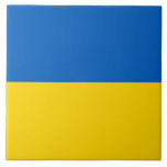 Ukraine Flag on Tile<br><div class="desc">Add a vibrant touch to your home décor with our exclusive tile featuring the flag of Ukraine! Crafted with meticulous attention to detail, this tile is not just a functional item; it’s a celebration of Ukrainian heritage and cultural pride. The striking design prominently displays the iconic Ukrainian flag, making this...</div>