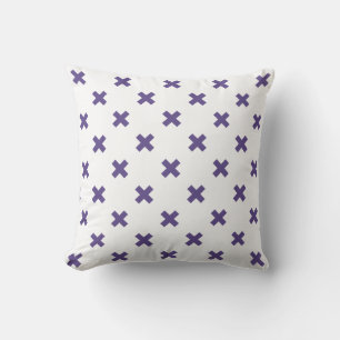 Ultra violet cross stitches on white cushion