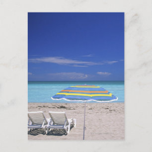 Umbrella and two lounge chairs on beach, Miami Postcard