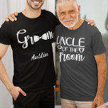 UNCLE of the GROOM T-Shirt<br><div class="desc">The groom might have a cousin who will want to show his stature at his cousin's wedding day. Text says UNCLE of the GROOM. The same text and colour repeats on the back of this t-shirt. The text is an image so that the colour can be changed to any you...</div>