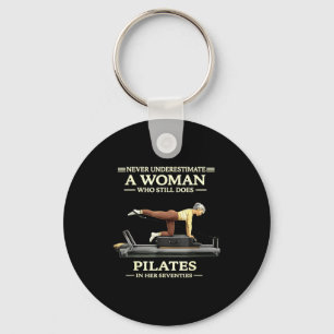 Underestimate a woman who does pilates in 70s key ring