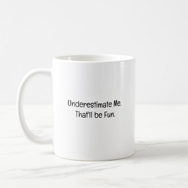 Underestimate Me. That'll be Fun Coffee Mug (Left)