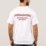 Undiagnosed But Something Ain't Right Funny  T-Shirt<br><div class="desc">“Undiagnosed But Something Ain’t Right” design is a humourous mental health gift that reflects the unique frequency of the brain, even without an official diagnosis. This sarcastic design is perfect for those who appreciate humour and self-awareness, making it an ideal gift for friends, family, or anyone who appreciates sarcasm and...</div>