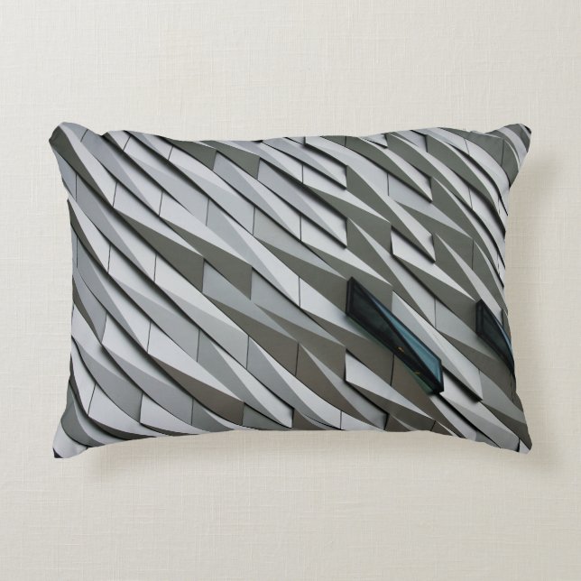 Undulating abstract shapes on a building facade at decorative cushion (Front)