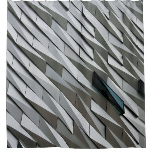 Undulating abstract shapes on a building facade at shower curtain