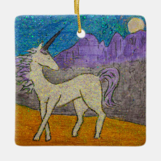 Unicorn looking back at the mountain ridgeline ceramic ornament