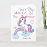 Unicorn Magical 2nd Birthday Pink Card<br><div class="desc">A cute and sweet magical unicorn birthday card design featuring a colourful unicorn standing on a cloud and Rainbow with a background of shooting stars and hearts.The card has the wording - Have a Magical Birthday in a colourful font . A sweet, cute and magical design for a little girl...</div>