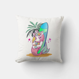 Unicorn with surfboard on the beach cushion