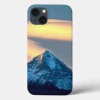Unique Clouds Over Snow Covered Mountains