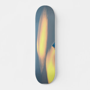 Unique Clouds Over Snow Covered Mountains Skateboard
