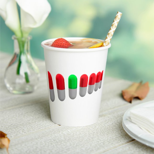 Unique Green Pill Among Red Capsules  Paper Cups (Creator Uploaded)