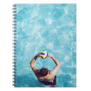 Unknown person playing beach volleyball notebook
