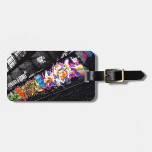 urban graffiti street art black & white with luggage tag