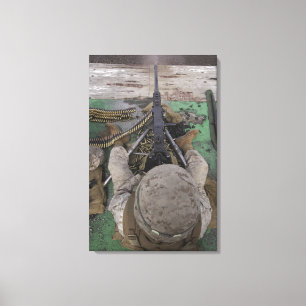 US Marine fires an M2 50-calibre machine gun Canvas Print