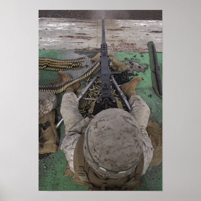 US Marine fires an M2 50-calibre machine gun Poster (Front)