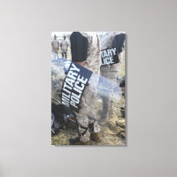 US Marines and Sailors don riot gear