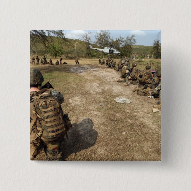 US Marines provide security as a UH-1N 15 Cm Square Badge (Front)