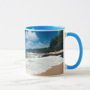 USA, Kauai, Hawaii. A Woman Strolls The Rocks Mug