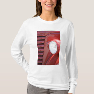 USA, Maine, Owl's Head. Headlight and partial T-Shirt