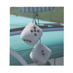 USA, Massachusetts, Gloucester. Fuzzy dice in a Notepad