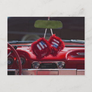 USA, Massachusetts, Gloucester. Fuzzy dice with Postcard