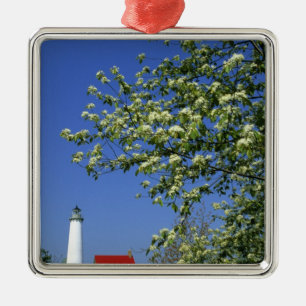USA, Michigan, East Tawas. Tawas Lighthouse with Metal Tree Decoration