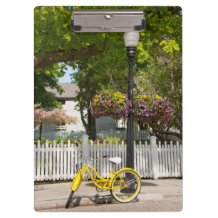 USA, Michigan, Mackinac Island. Yellow Bike Clipboard