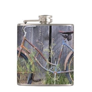 USA, Oregon, Bend. A dilapidated old bike Hip Flask
