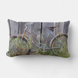 USA, Oregon, Bend. A dilapidated old bike Lumbar Cushion