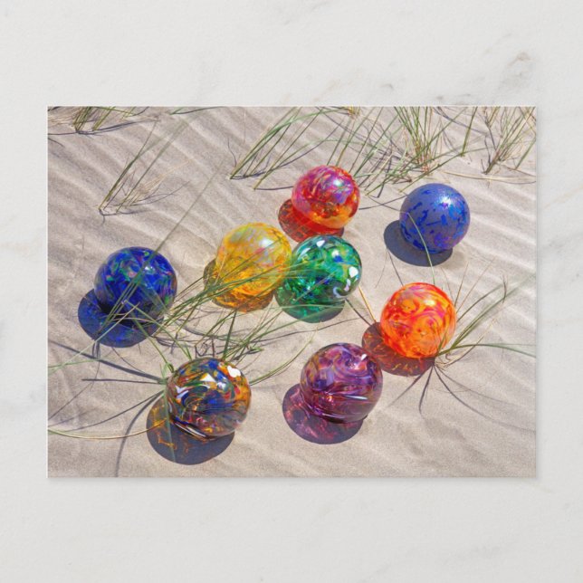USA, Oregon. Colourful Glass Floats On Sand Dune Postcard (Front)