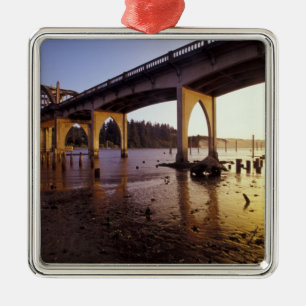 USA, Oregon, Florence. Siuslaw Bridge and Metal Tree Decoration