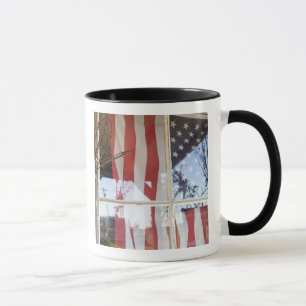 USA, Oregon, Shaniko. Flag in window next to Mug