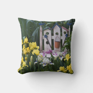 USA, Pennsylvania. Garden irises grow around Cushion