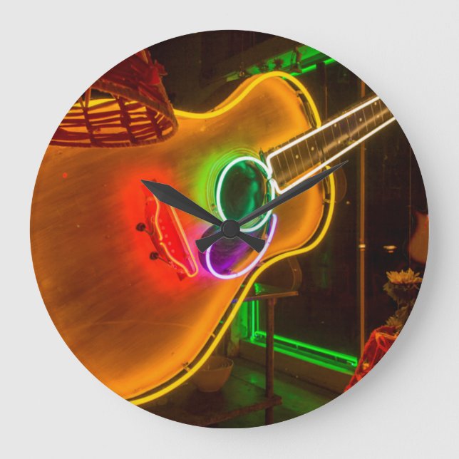USA, Texas, Austin. Neon Guitar At Blackmail Large Clock (Front)