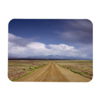 USA, Utah, Dirt road crossing landscape