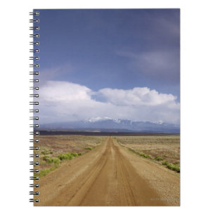 USA, Utah, Dirt road crossing landscape Spiral Notebook