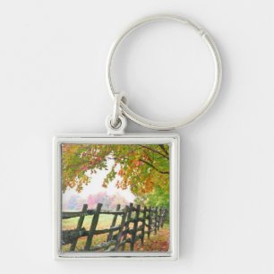 USA, Vermont. Fence under fall foliage. Key Ring