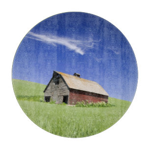 USA, Washington, Old Red Barn in the Spring Cutting Board