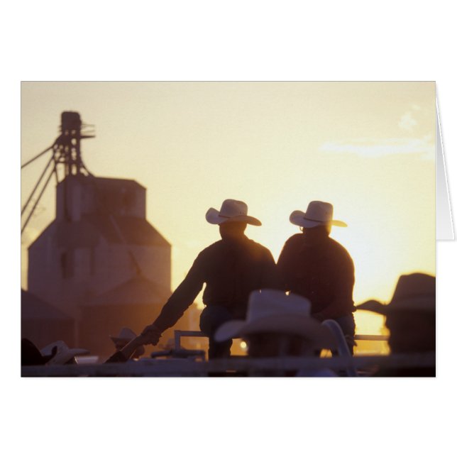 USA, Wyoming, Pine Bluffs. Two men shake (Front Horizontal)