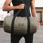 Utility Military Style Army Green Duffle Bag<br><div class="desc">A military style design in army green buff brown with a personalised monogram initial in a utilitarian stencil style typography in black. The perfect gift or accessory for any soldier or military personnel.</div>