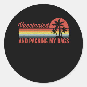 Vaccinated and packing my bags classic round sticker