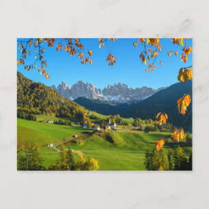 Val di Funes valley with autumn leaves postcard